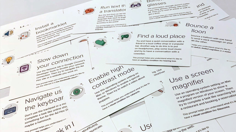 A photograph of cards that describe different exercises to help participants understand what it's like to accomplish tasks in different scenarios.